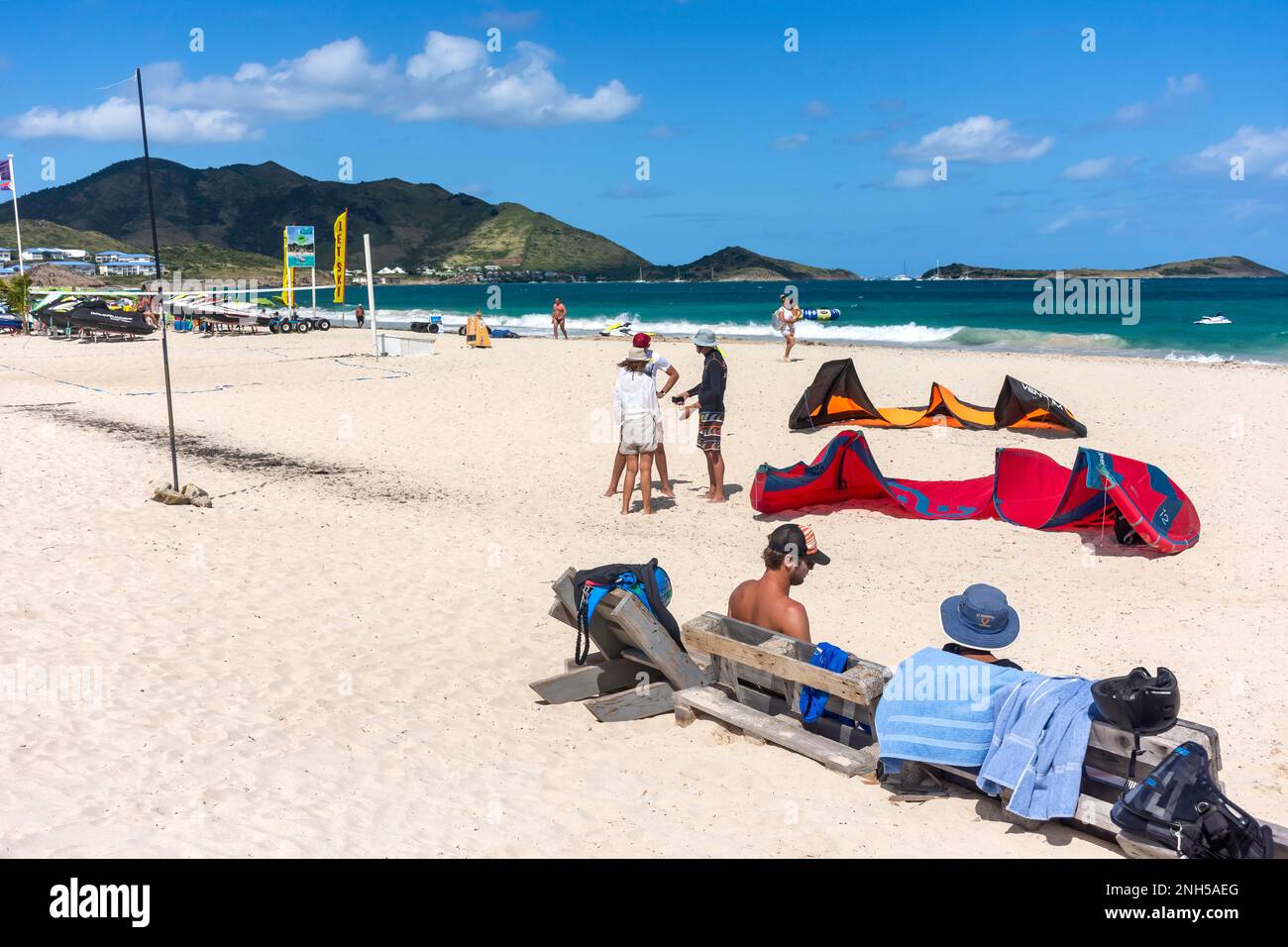 Kite surfers on beach, Orient Bay (Baie Orientale), St Martin (Saint-Martin), Lesser Antilles, Caribbean Stock Photo