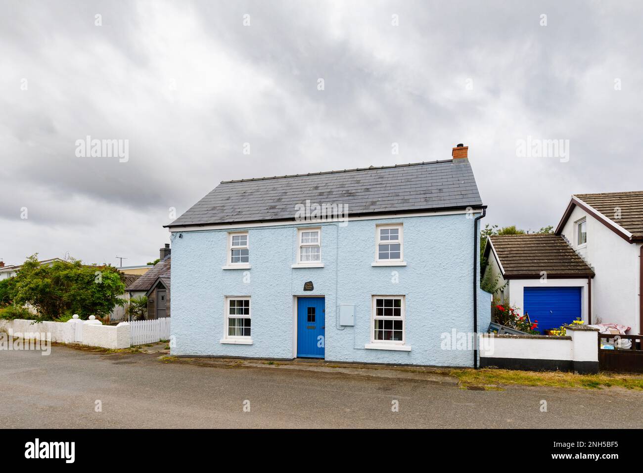 Blue roadside cottage in Marloes, a small village on the Marloes