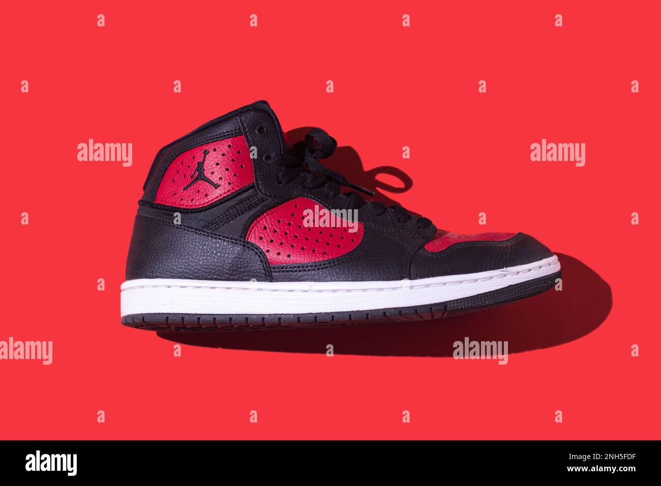 Red and black air jordan 1 shoes hi-res stock photography and images - Alamy