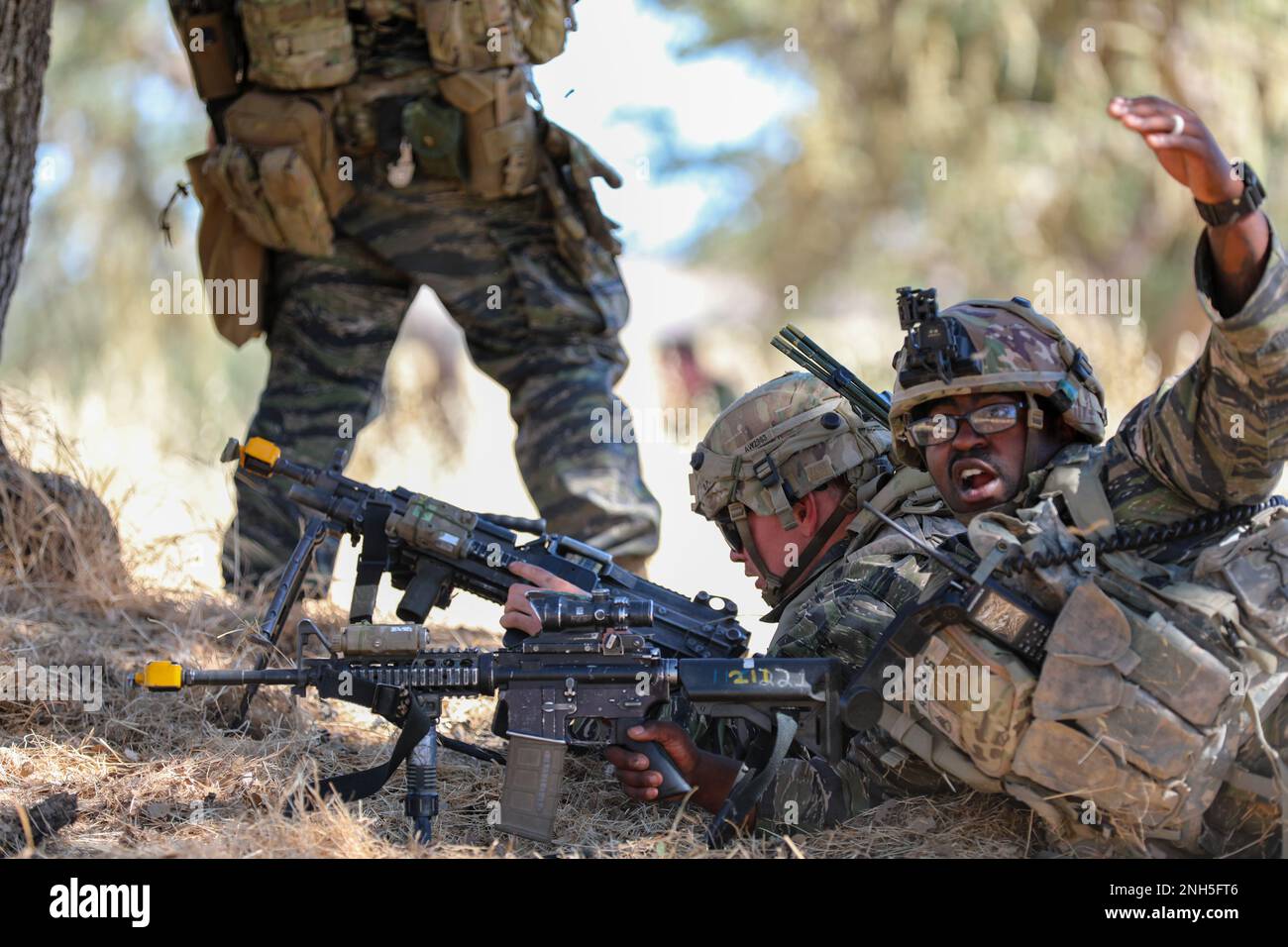 U.S. Army Staff Sgt. Clay J. Adams Jr., an infantryman assigned to 1st  Battalion, 23rd Infantry Regiment, 2nd Stryker Brigade Combat Team, 2nd  Infantry Division repositions his Soldiers in preparation to ambush