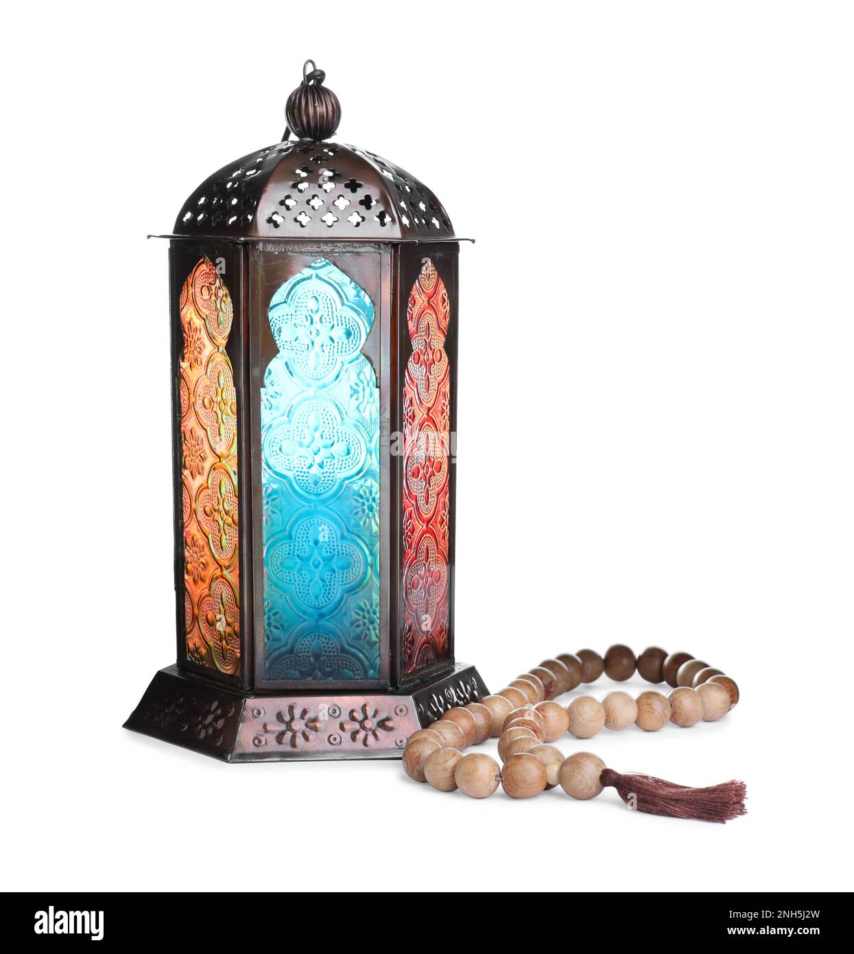 Decorative Arabic lantern and prayer beads on white background Stock