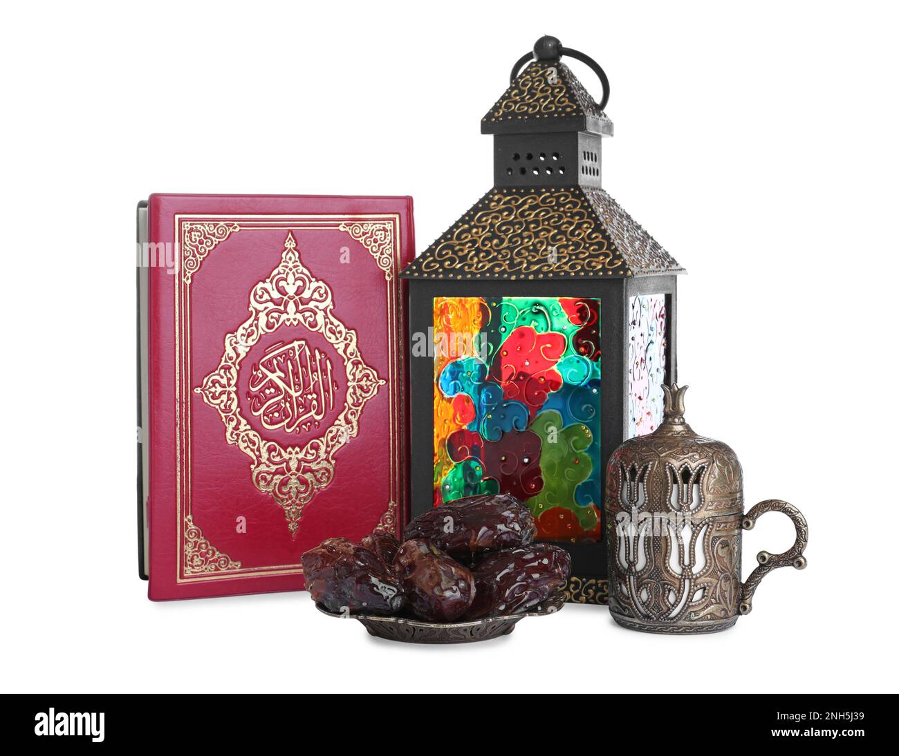 Decorative Arabic lantern, Quran, dates and coffee on white background