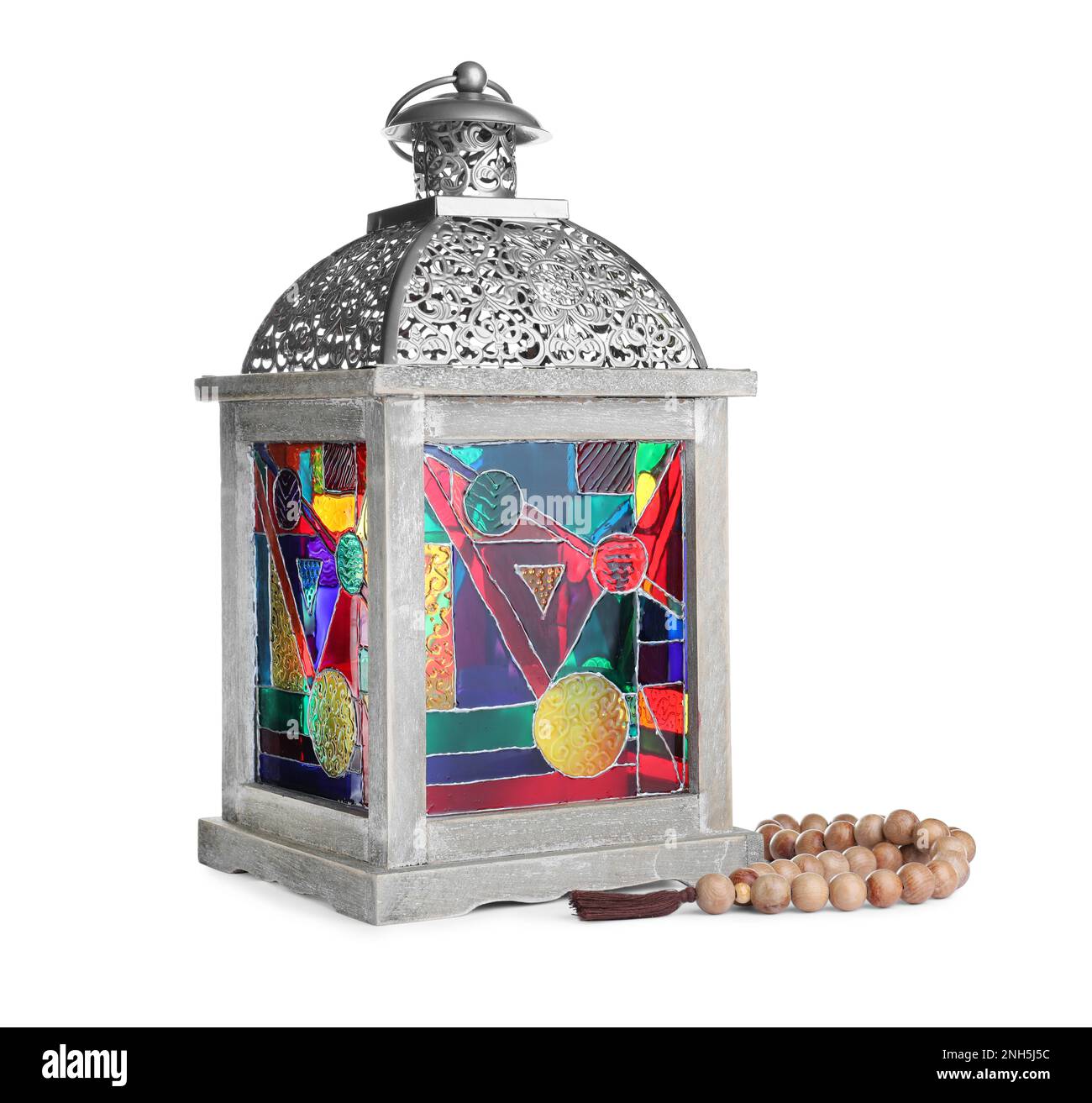 Decorative Arabic lantern and prayer beads on white background Stock
