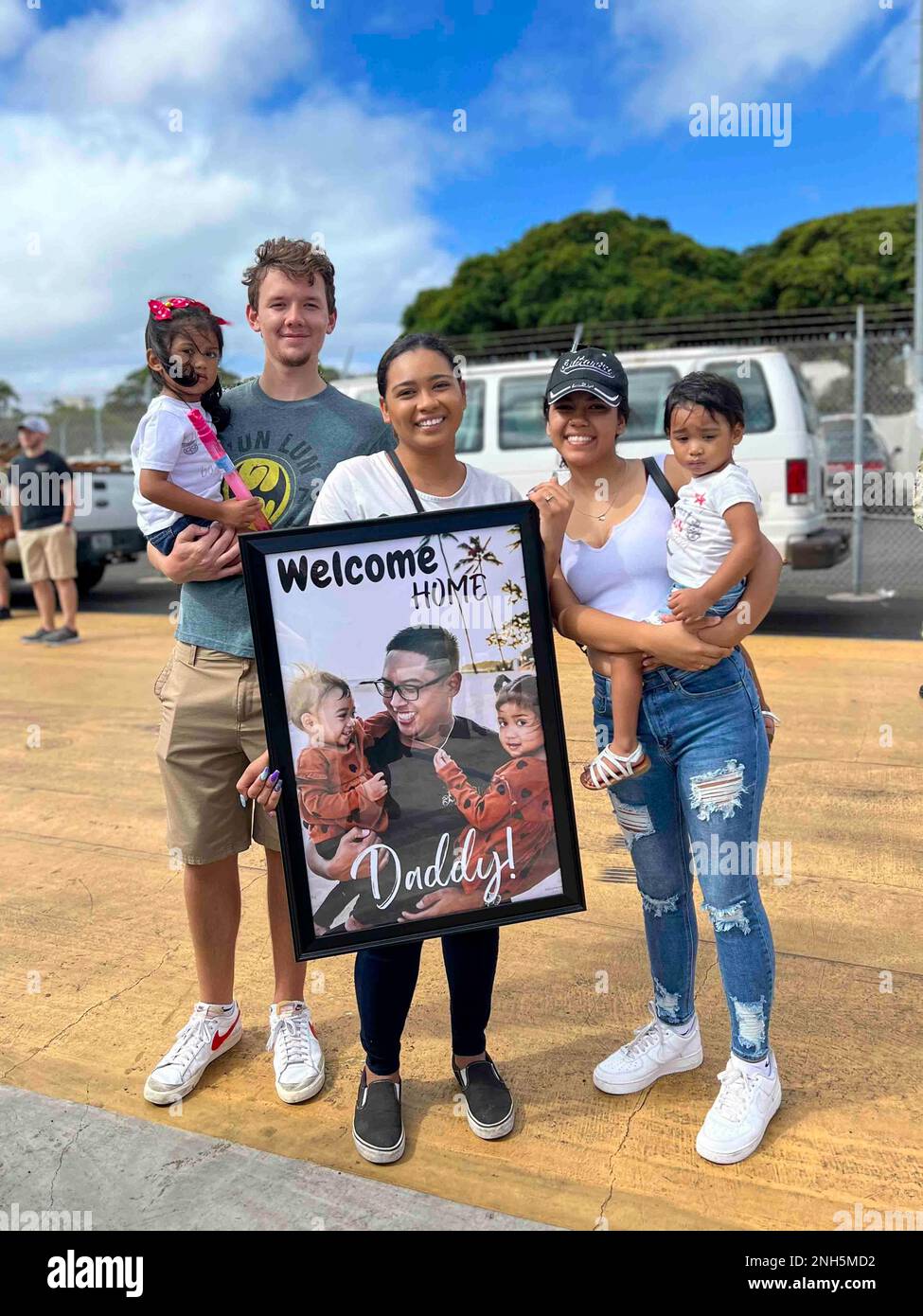 220718-N-RB283-0015  USS Port Royal (CG-73) homecoming after being deployed since January 2022. Families welcomed sailors with signs and hugs at Joint Base Pearl Harbor-Hickam, Hawaii, July 14, 2022. Stock Photo