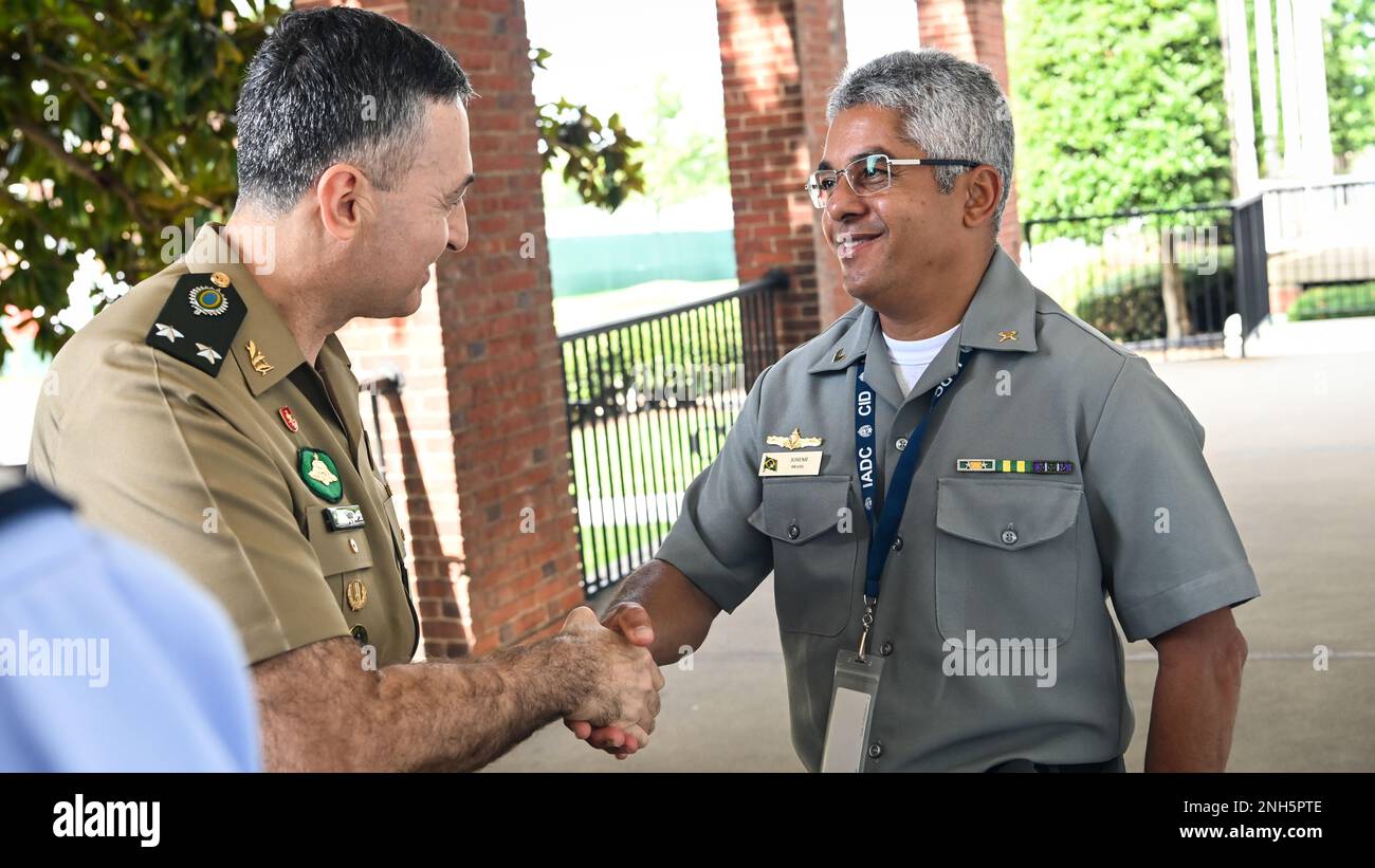 Inter-American Defense College Leadership Welcomes Major-Brigadeiro do Ar Edson Fernando da Costa Guimaraes Outgoing Chief of Delegation of Brazil and General de Brigada Giovani Moretto Incoming Chief of Delegation of Brazil to the IADC on Fort Lesley J. McNair, Washington, D.C., July 18, 2022. During the visit, the guest conducted an office call with IADC Leadership, received an IADC brief, and concluded the visit with a tour of the campus with. Stock Photo