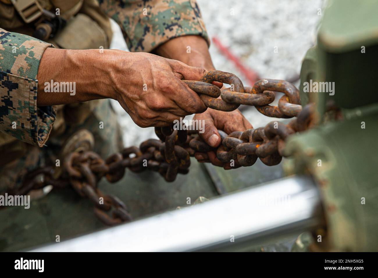 U.S. Marine Corps Lance Cpl. Chan Parkruiz, an engineer equipment ...