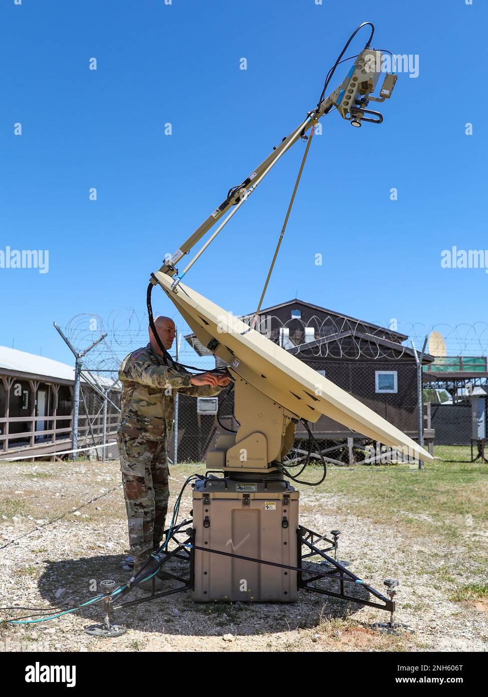 CAMP BONDSTEEL, Kosovo U.S. Army Sgt. 1st Class Joseph Johnson, a satellite communication