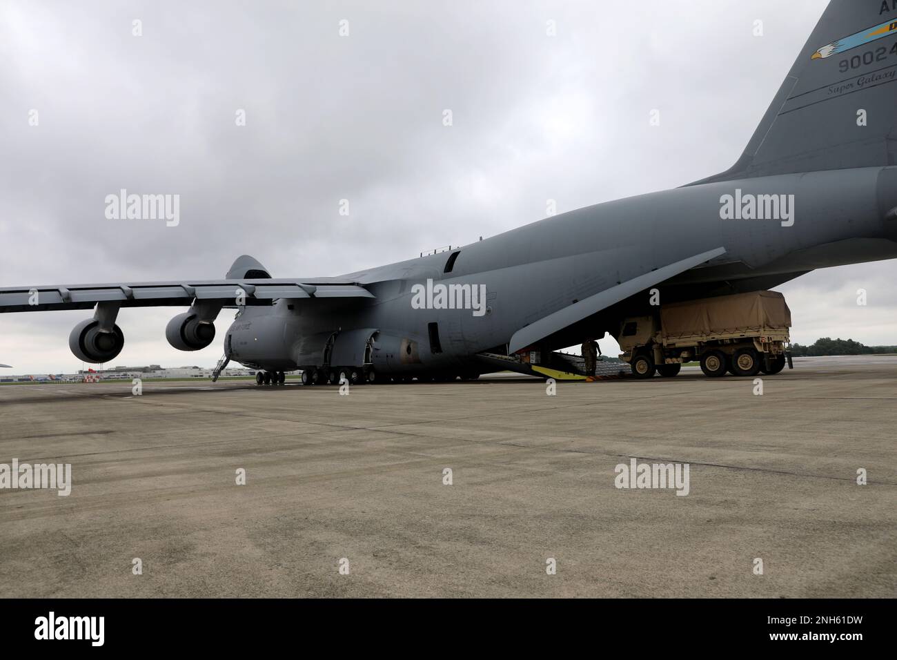 U.S. Army Soldiers of the 412th Civil Affairs Battalion, 360th Civil Affairs Brigade, are loading military vehicles inside of the C-5 Galaxy departing from John Glenn Columbus International Airport on July 18, 2022. Operation Viking is an intense joint task force exercise designed to prepare Soldiers with realistic training simulating deployment of civil affairs units in direct support of a contingency operation in Africa. Stock Photo