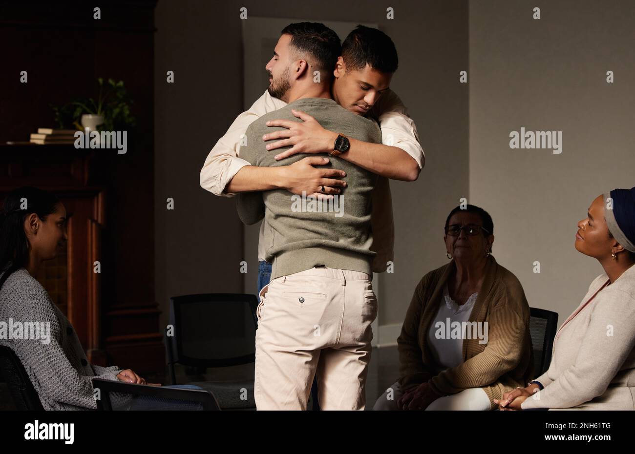 Men, support group hug and therapy counseling for drug abuse and mental