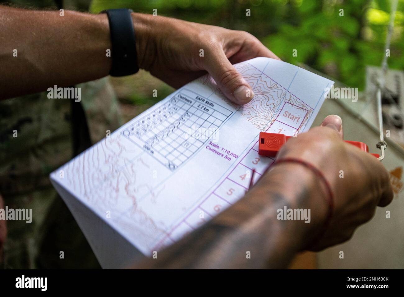 A CIOR competitor finds a point during a CIOR orienteering training at Camp Ethan Allen Training Site in Vermont on July 19, 2022. The Interallied Confederation of Reserve Officers Military Competition (CIOR MILCOMP) is a three-day team competition consisting of NATO and Partnership for Peace nations in Europe. It has been around since 1957. The competition is open to all reserve components for both NCO and officer. It is now run on a volunteer basis and funded by former competitors through an alumni association. Stock Photo