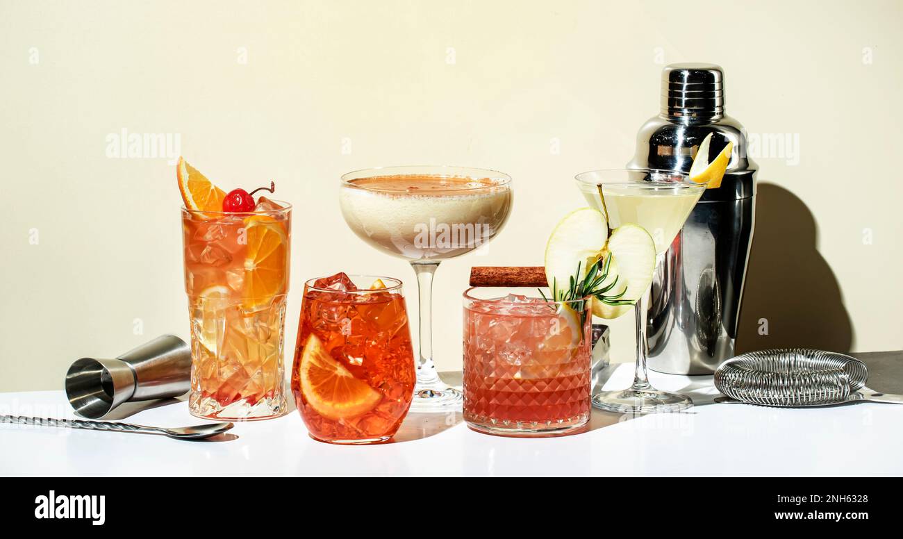 Cocktail party. Bright fruity and citrus alcoholic drinks with gin