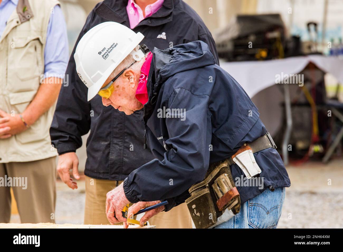 93 year old President Jimmy Carter puts his saw skills to use at the