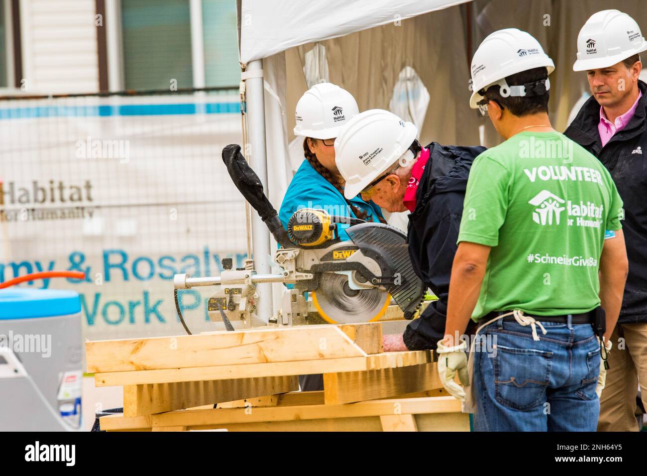 93 year old President Jimmy Carter puts his saw skills to use at the