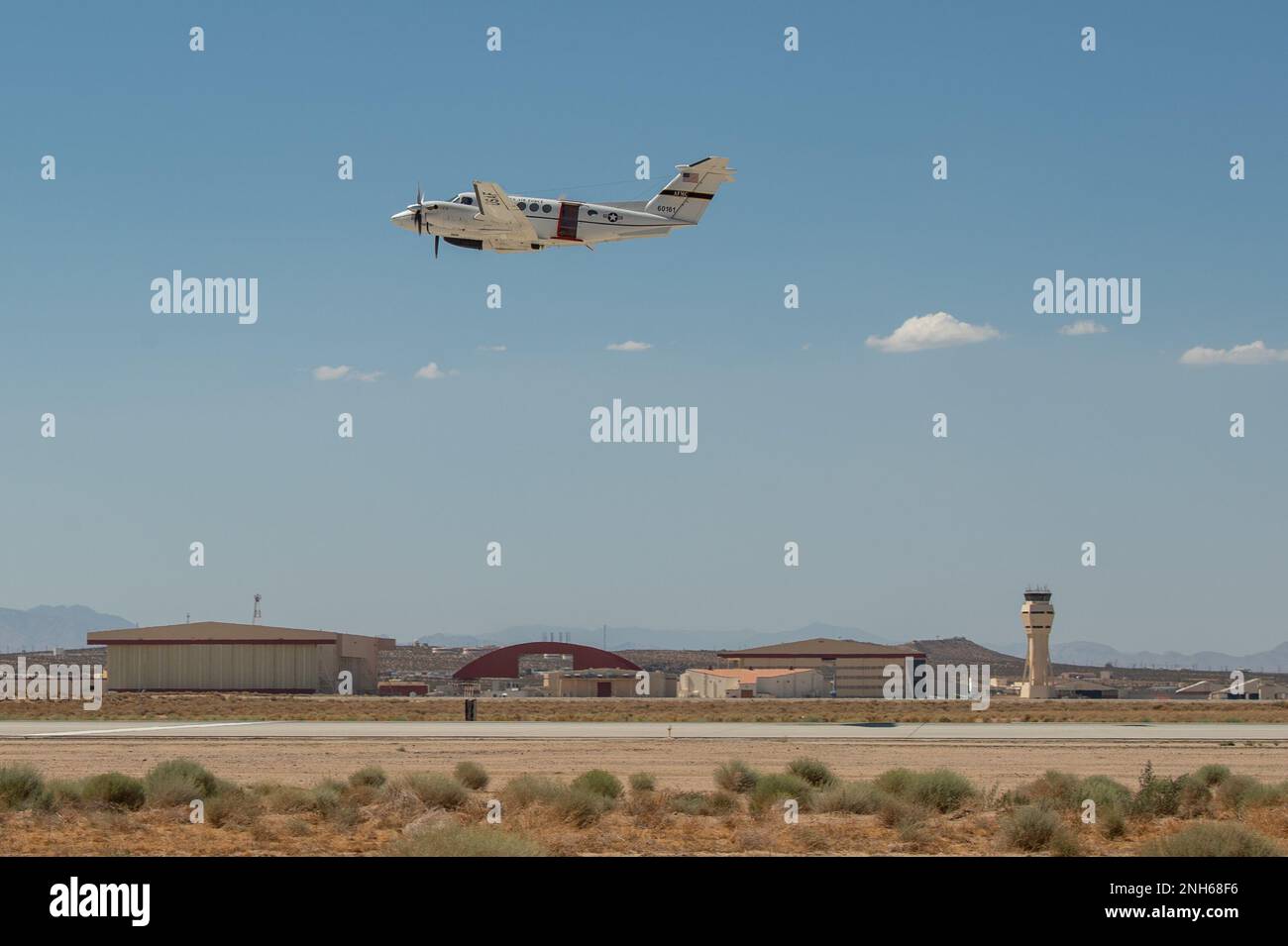 A C-12 Huron takes off from Edwards Air Force Base, California, to ...