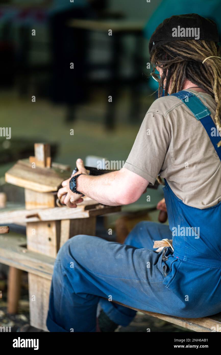 handcrafted woodwork builder, building a boat by hand out of huon pine