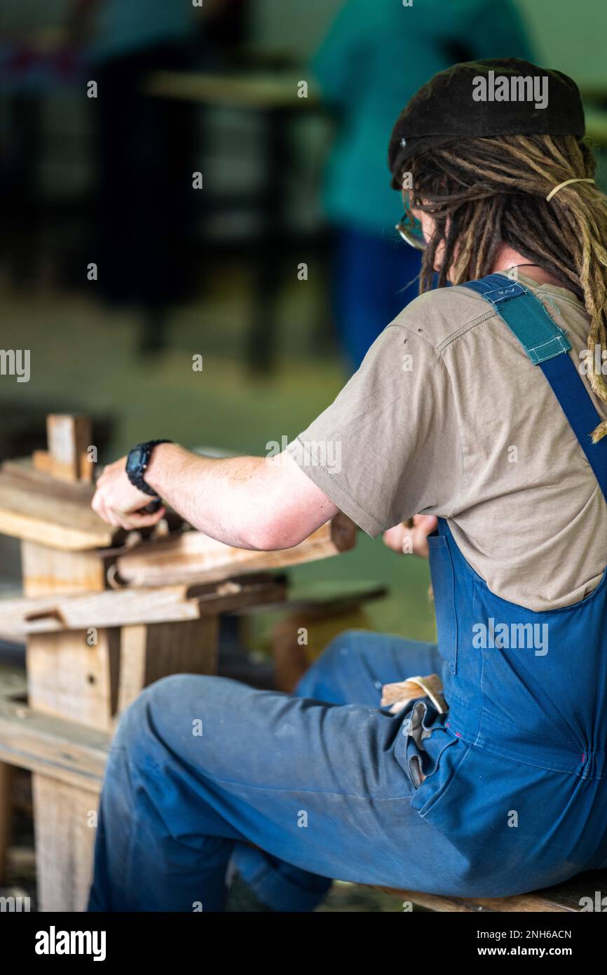 handcrafted woodwork builder, building a boat by hand out of huon pine