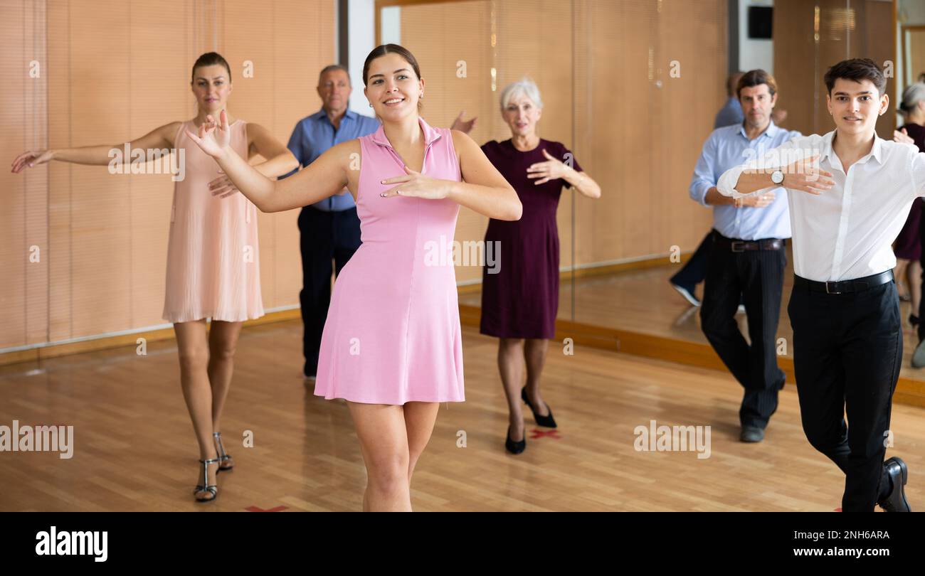 Young girl learning to dance kizomba in dancing class Stock Photo Alamy