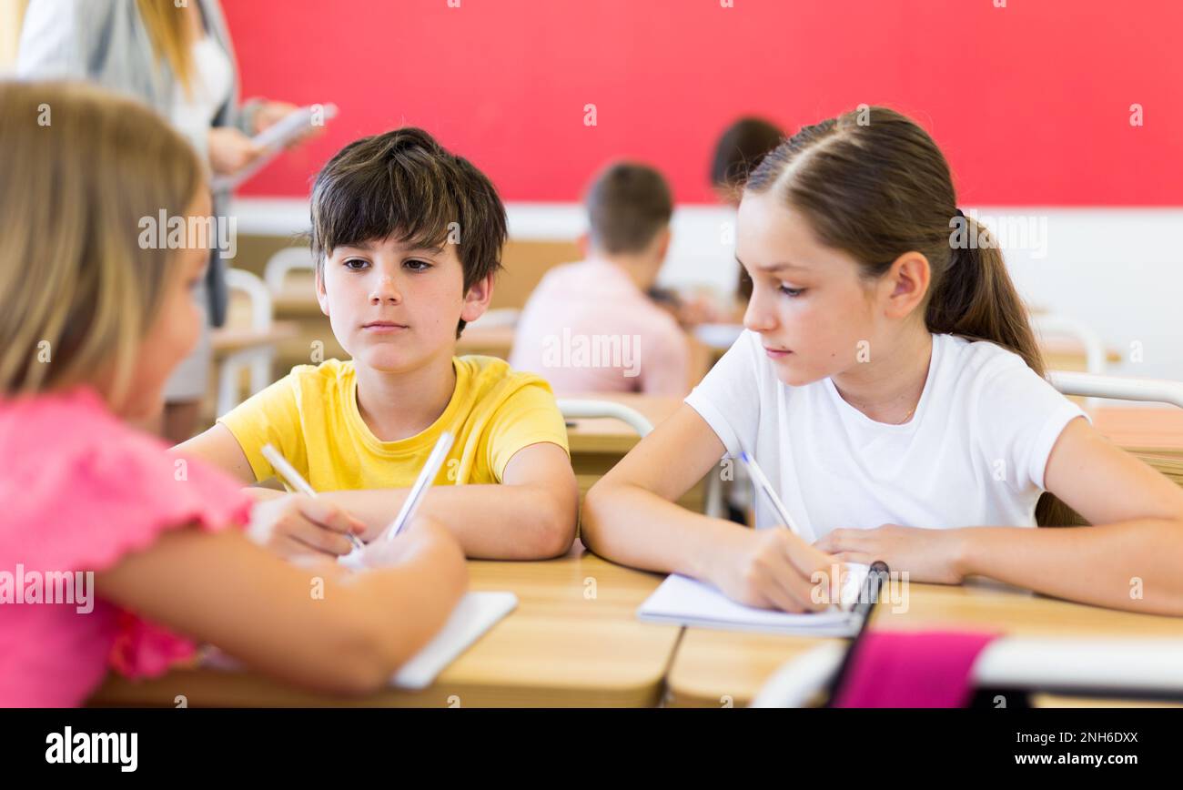 Kids doing group tasks Stock Photo Alamy
