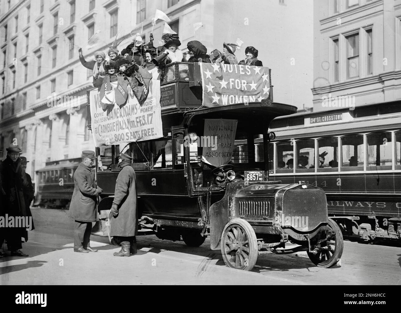 Washington Hikers - Suffragists on an ope top  bus in New York City on their way to Washington - 1913 Stock Photo