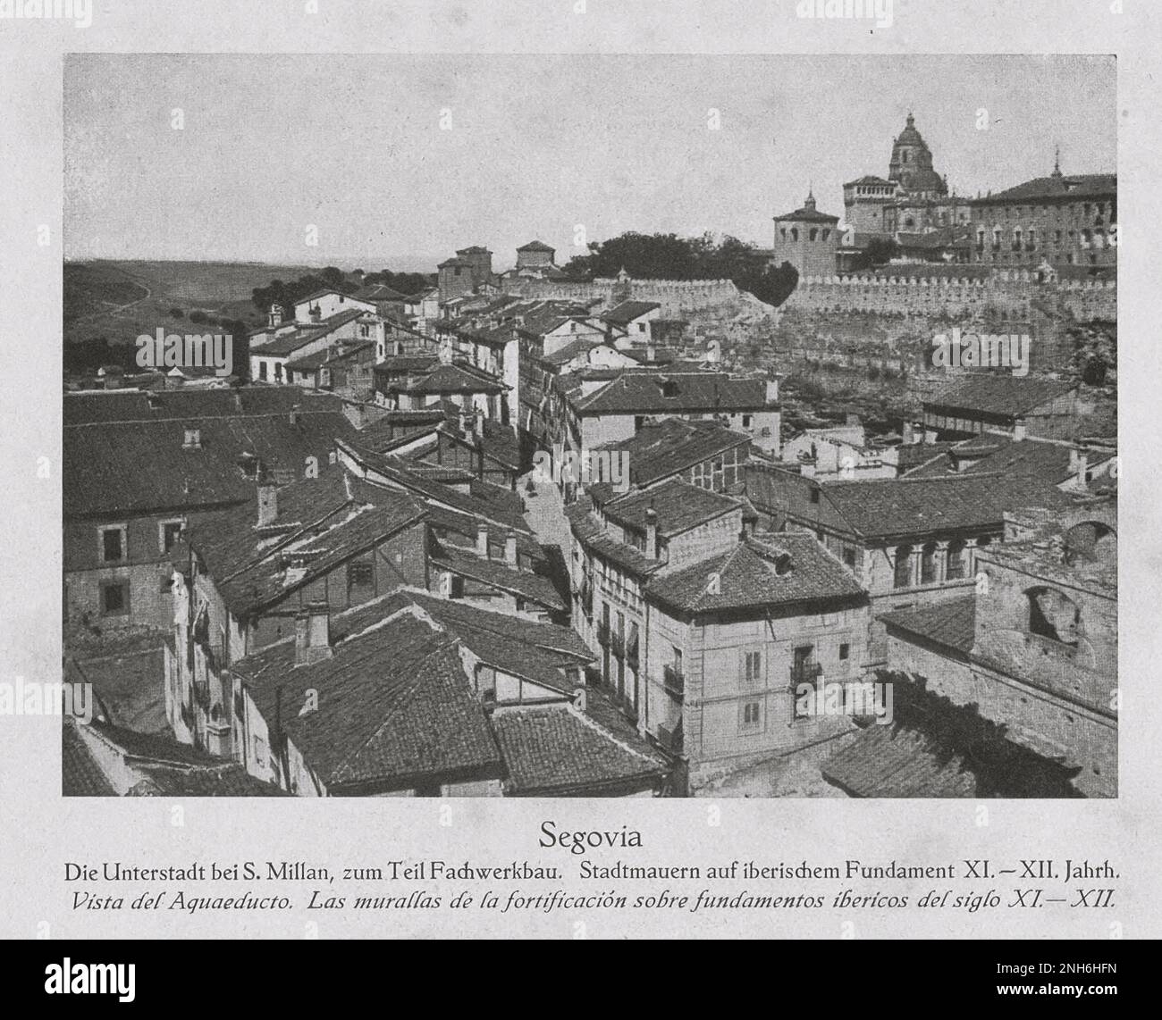 Architecture of Old Spain. Vintage photo of Segovia. The lower town near St. Millan, partly half-timbered. City walls on an Iberian foundation XI-XII century Stock Photo