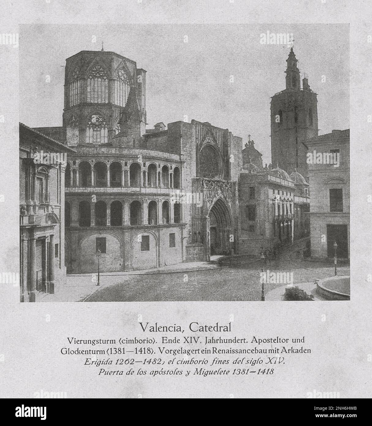 Architecture of Old Spain. Vintage photo of Valencia Cathedral. Ciborium. End of 14th century. Apostle's Gate and Bell Tower (1381-1418). In front of a Renaissance building with arcades Stock Photo