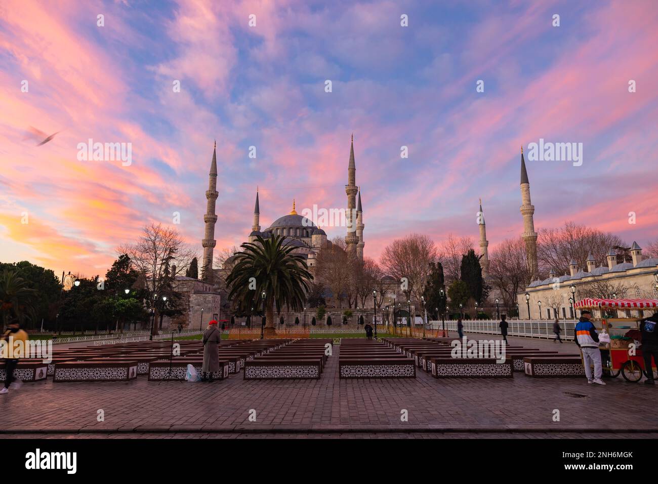 Sultanahmet or Blue Mosque at sunrise with pink and orange clouds ...