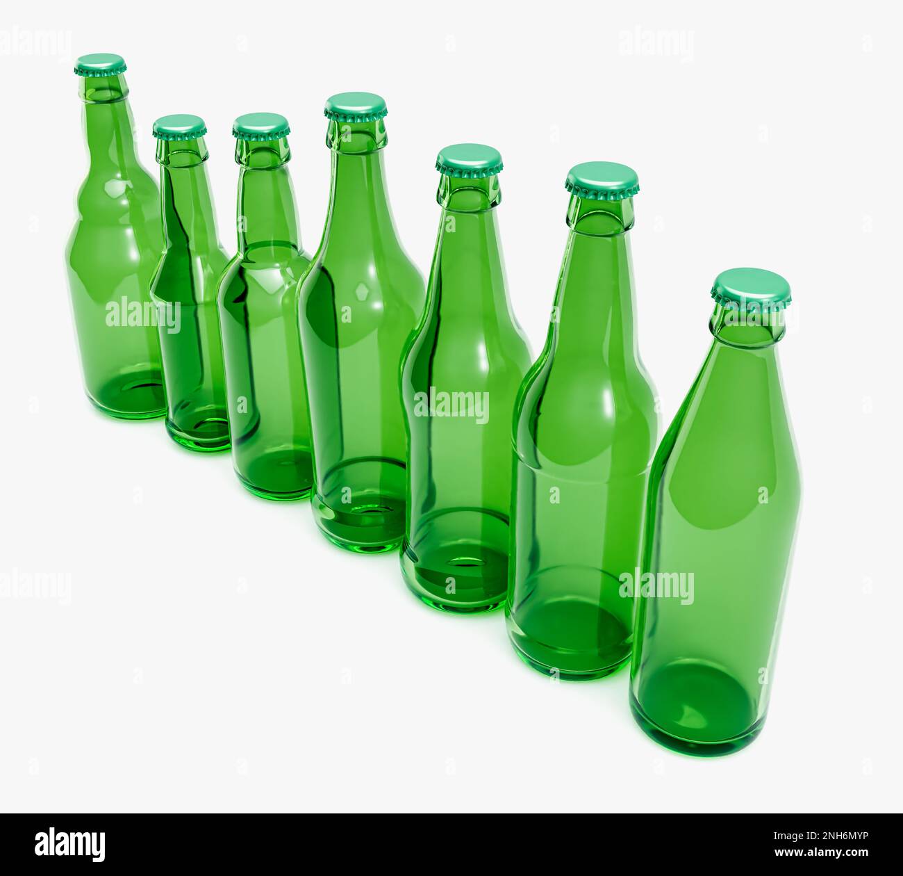 A range of green glass beer bottles on an isolated white studio