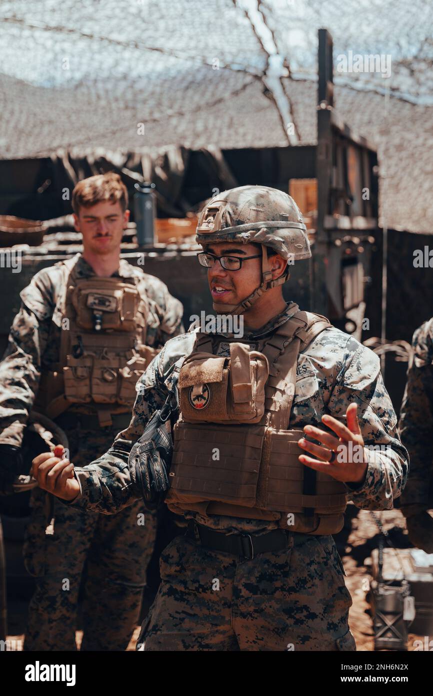 POHAKULOA TRAINING AREA, Hawaii (July 20, 2022) U.S. Marine Corps Sgt. Jesus Colon, a Reading, Penn., native and section chief with 1st Battalion, 12th Marines, 3rd Marine Division, gives remarks at Pōhakuloa Training Area, Hawaii, July 20, 2022. Marines with 1/12 conducted internationally integrated fire missions with Chilean Soldiers and Mexican Naval Infantry as part of Rim of the Pacific (RIMPAC) 2022. Twenty-six nations, 38 ships, three submarines, more than 170 aircraft and 25,000 personnel are participating in RIMPAC from June 29 to Aug. 4 in and around the Hawaiian Islands and Southern Stock Photo