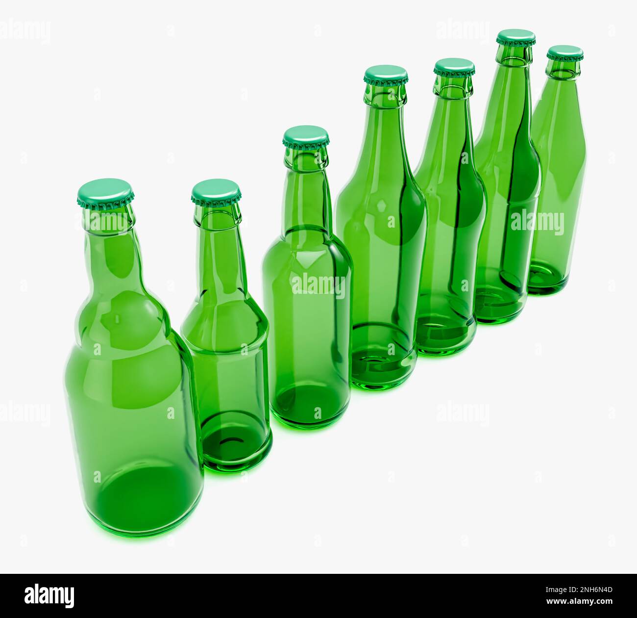 A range of green glass beer bottles on an isolated white studio