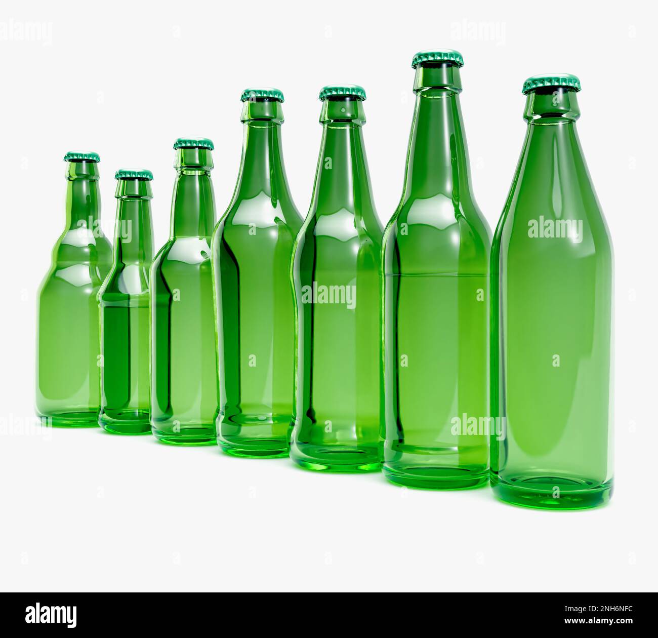 A range of green glass beer bottles on an isolated white studio
