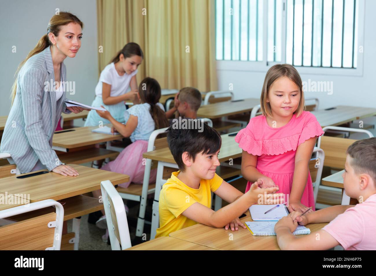 Kids doing group tasks Stock Photo Alamy