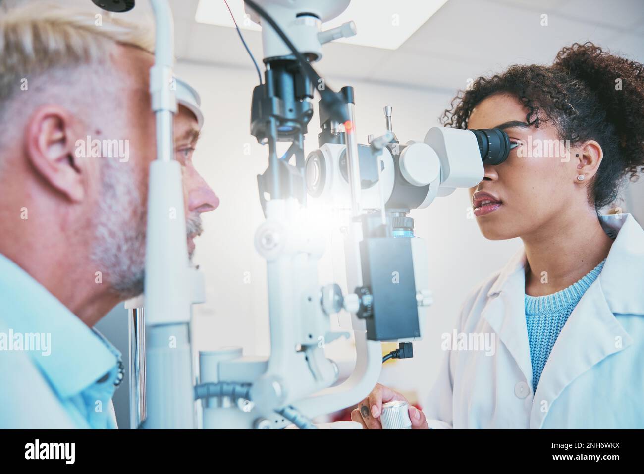 Consulting, ophthalmology and eye exam with doctor and patient for