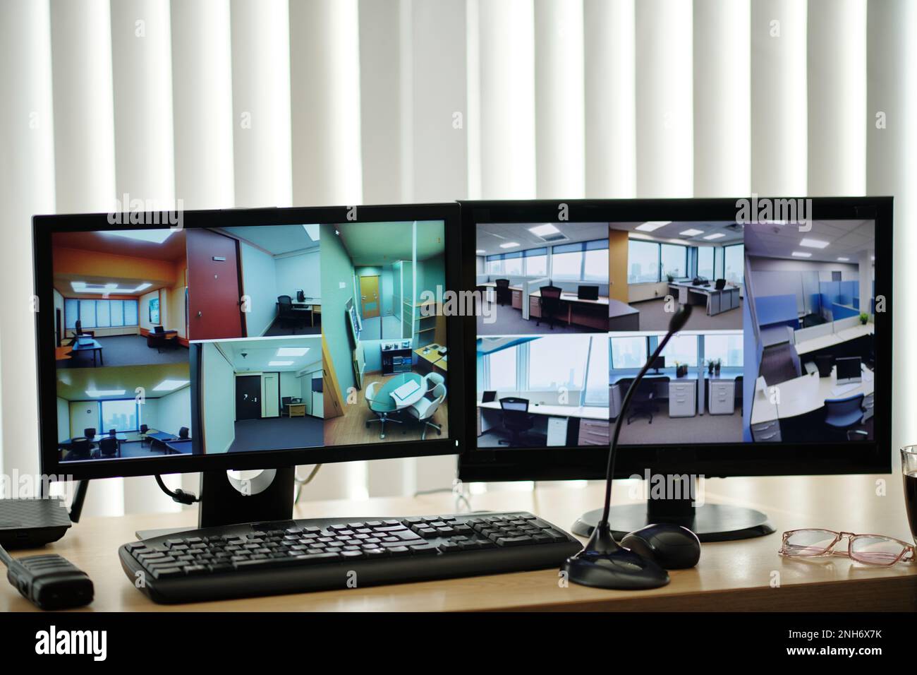 Computer monitors with footage from surveillance cameras Stock Photo