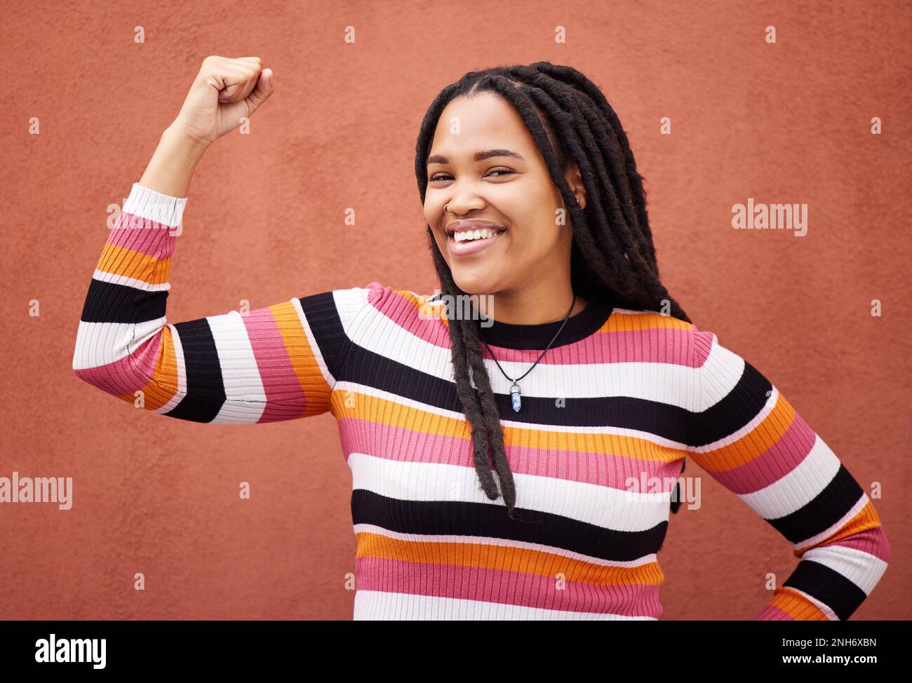 Flexing muscle woman retro hi-res stock photography and images - Alamy
