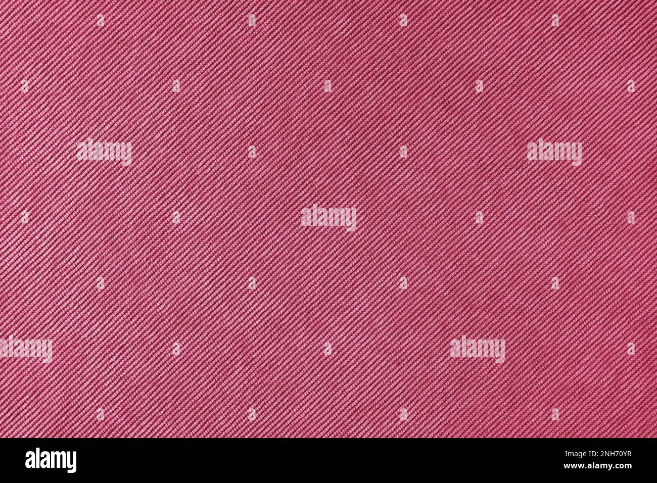 Texture background of velours magenta fabric. Upholstery velveteen texture fabric, corduroy furniture textile material, design interior, decor. Ridge Stock Photo