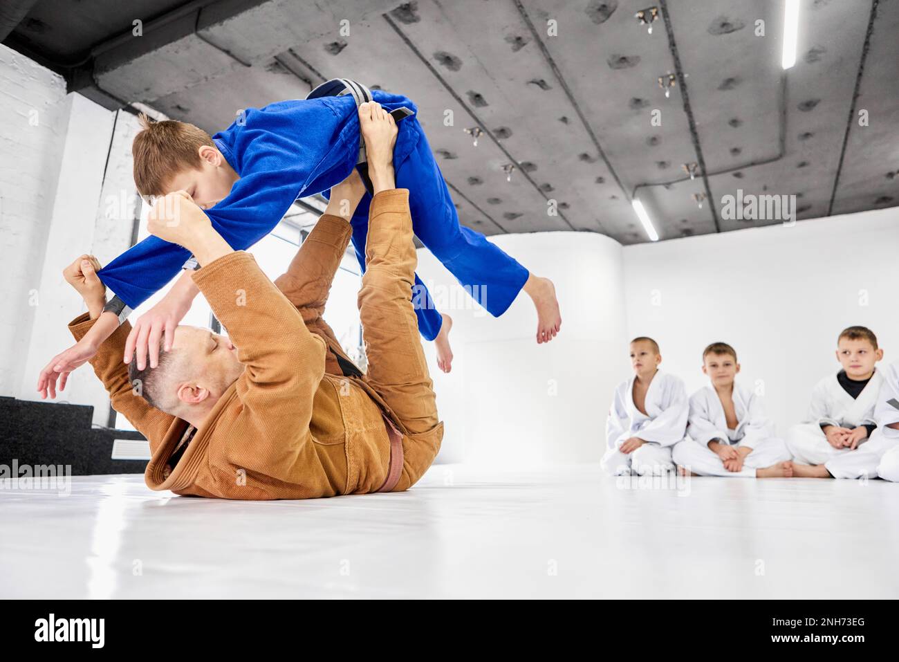 Teacher, professional judo, jiu jitsu coach training kinds, boys