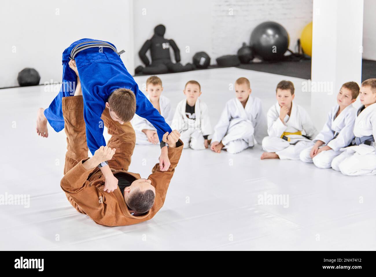 Teacher, professional judo, jiu jitsu coach training kinds, boys