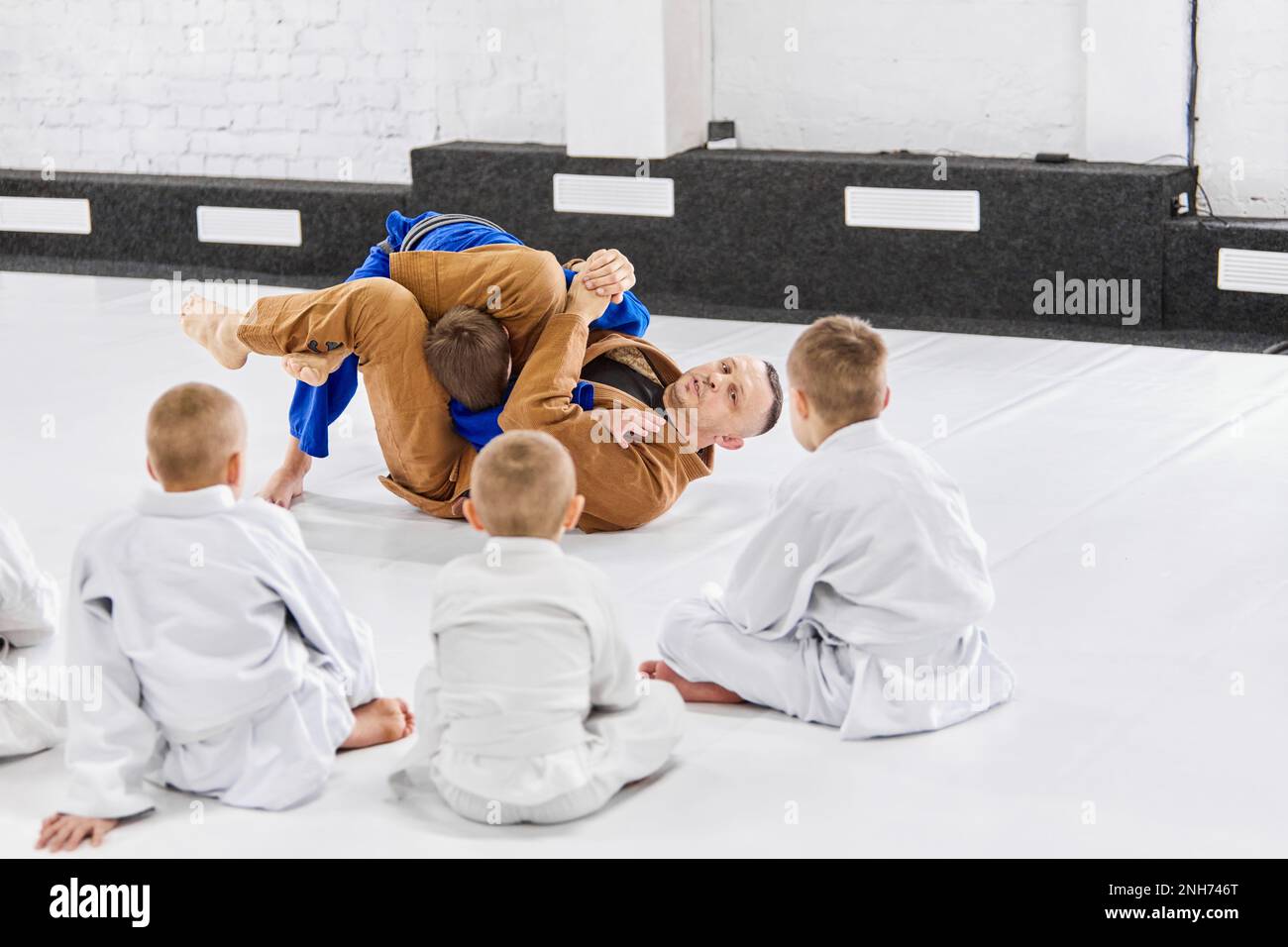 Teacher, professional judo, jiu jitsu coach training kinds, boys
