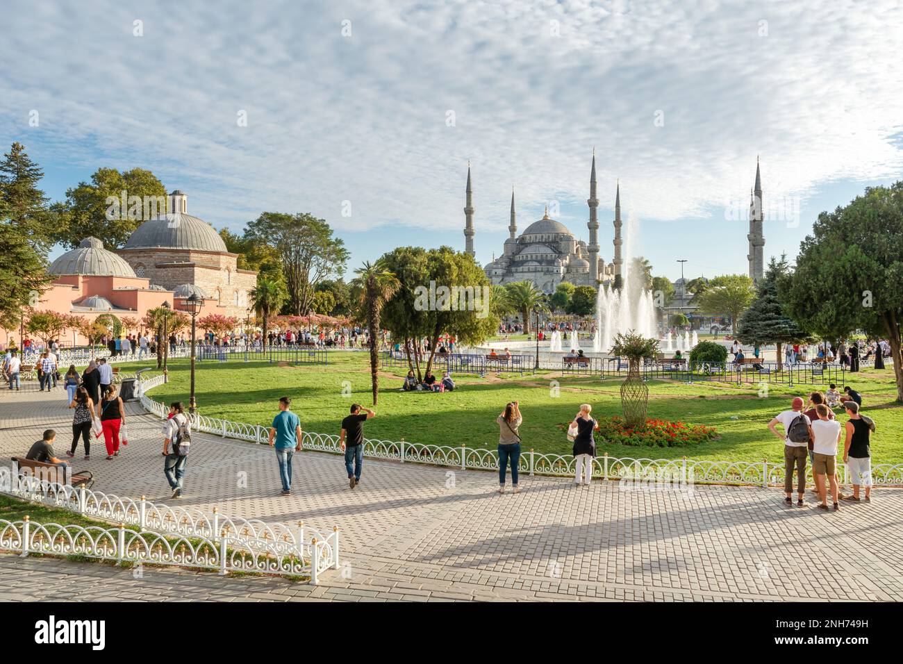 People walking and enjoying park at Sultanahmet Square; (The Old Hippodrome Of Constantinople), famous tourist attraction and landmark of  Istanbul. Stock Photo