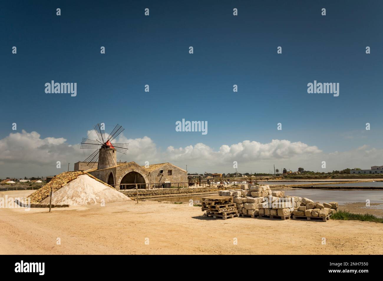 View of a traditional windmill, salt pans of Trapani Stock Photo