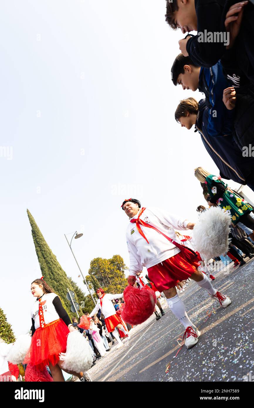 Gender-Bending Cheerleader Dance: Unconventional Carnival Fun Stock Photo