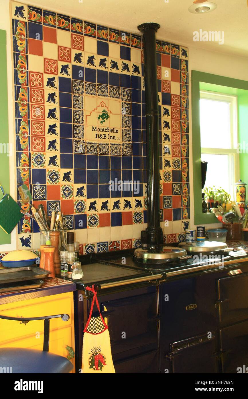 Kitchen stove and beautiful tiled backdrop of MonteBello Bed and Breakfast Inn in Ames, Iowa USA. Stock Photo