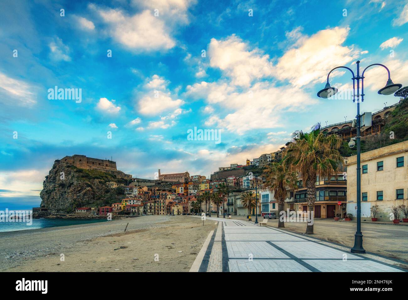 The seaside village of Scilla seen from the seafront at first morning lights, Calabria Stock Photo