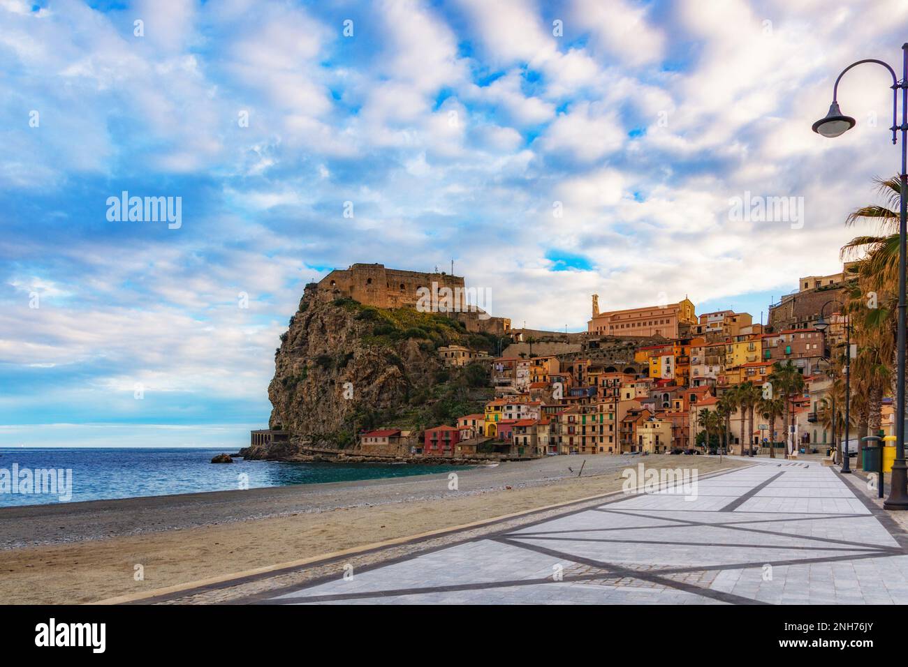 The seaside village of Scilla seen from the seafront at first morning lights, Calabria Stock Photo
