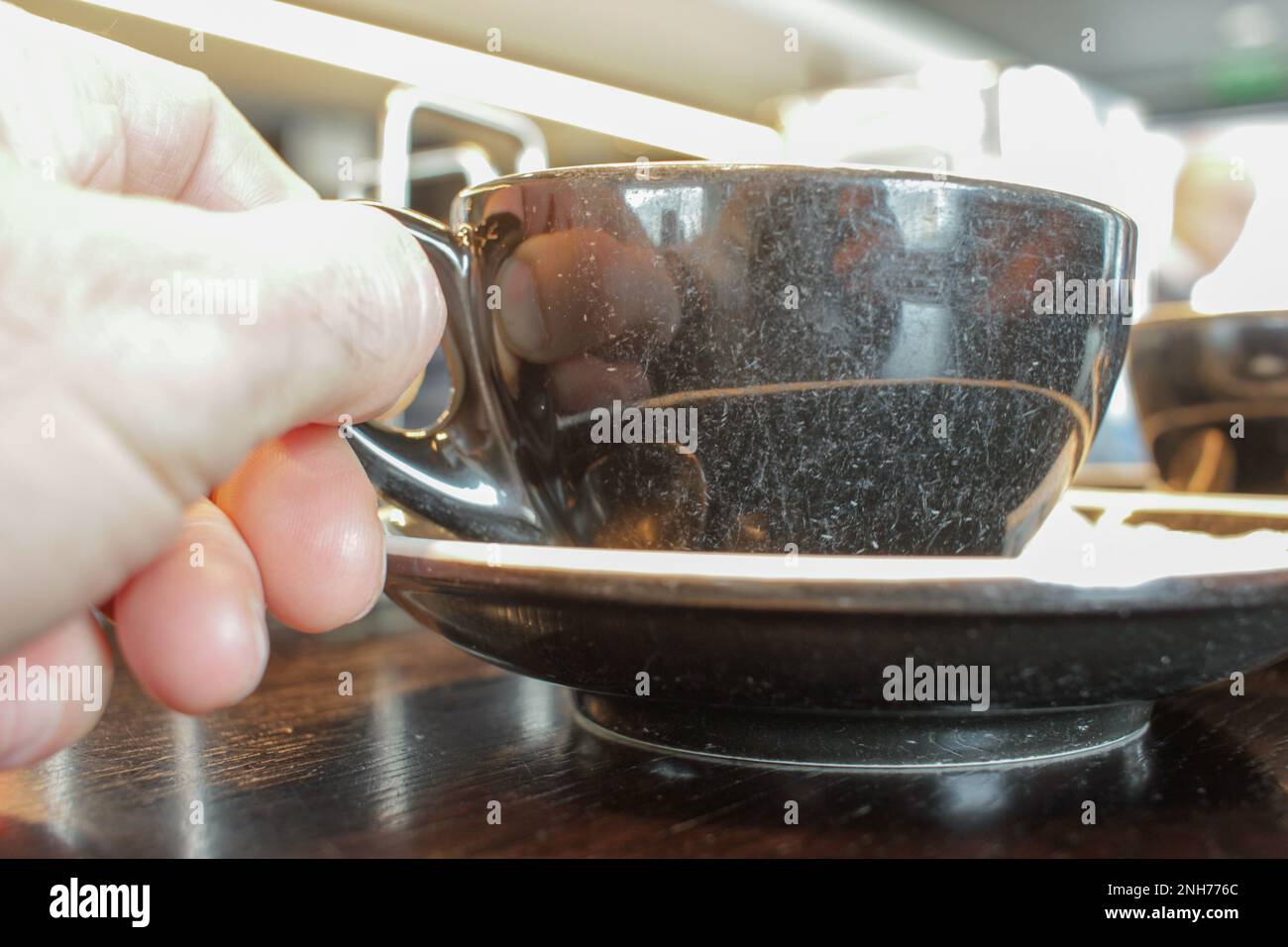 having a cup of coffee in a cafeteria in the morning Stock Photo