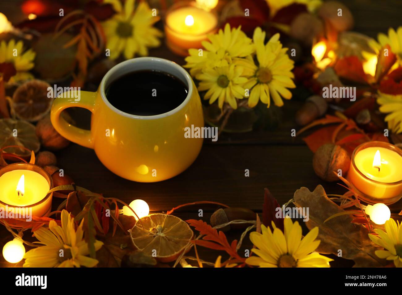 cup of coffee on the autumn background with leaves and flowers Stock Photo
