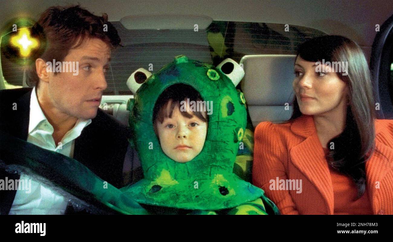 LOVE ACTUALLY 2003  Universal Pictures film with from left: Hugh Grant, Billy Campbell as a Nativity play octopus and Martine McCutcheon Stock Photo