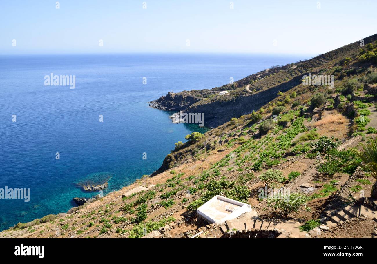 Panoramic view on Punta Limarsi with the lighthouse on the promontory, Pantelleria Stock Photo