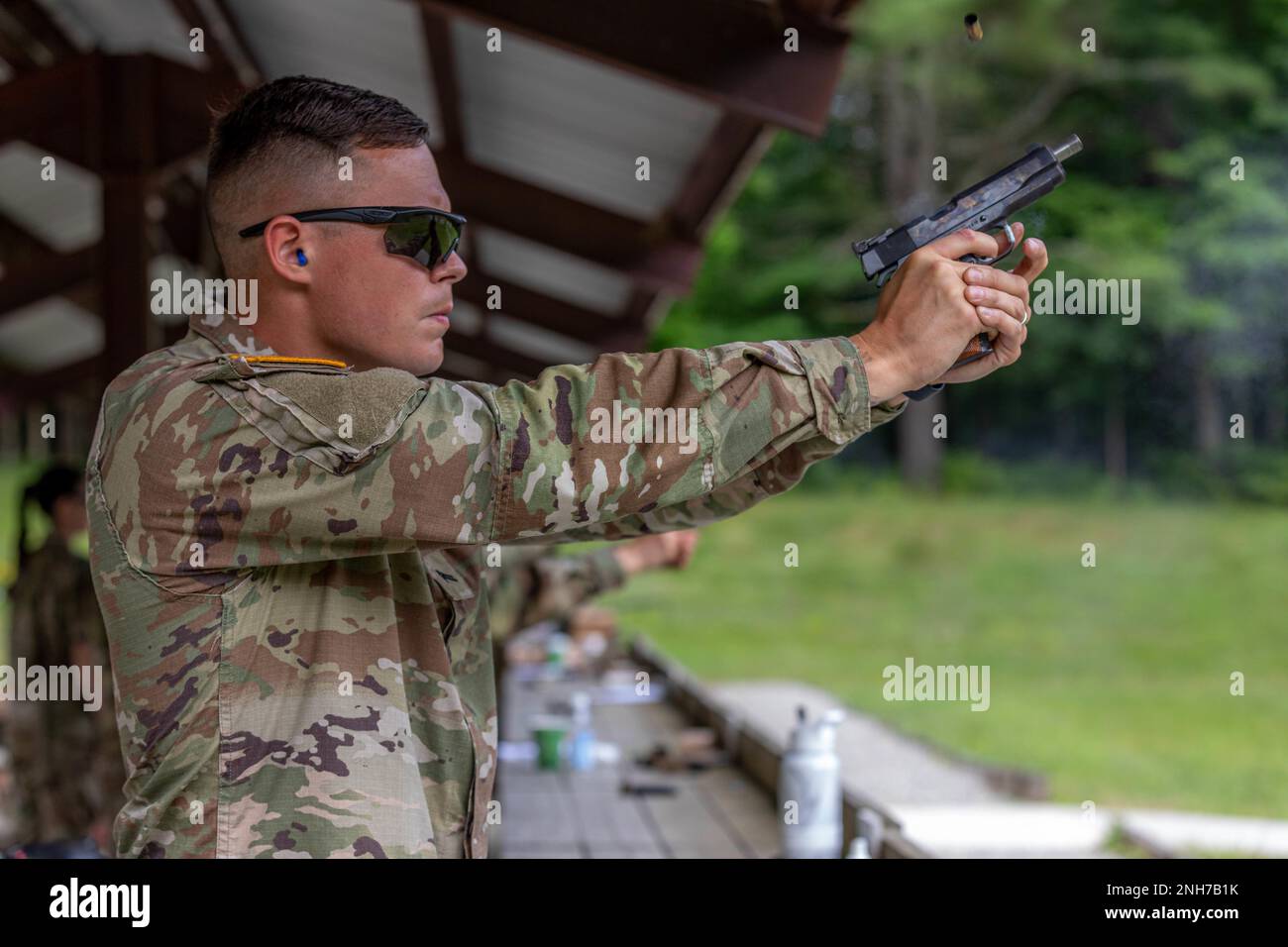 Army Reserve Cpl. Anton Shekhalevich, 412th Theater Engineer Command, fires a Colt 1911 pistol during a CIOR pistol practice event at Camp Ethan Allen Training Site in Vermont on July 21, 2022. The Interallied Confederation of Reserve Officers Military Competition (CIOR MILCOMP) is a three-day team competition consisting of NATO and Partnership for Peace nations in Europe. It has been around since 1957. The competition is open to all reserve components for both NCO and officer. It is now run on a volunteer basis and funded by former competitors through an alumni association. Stock Photo