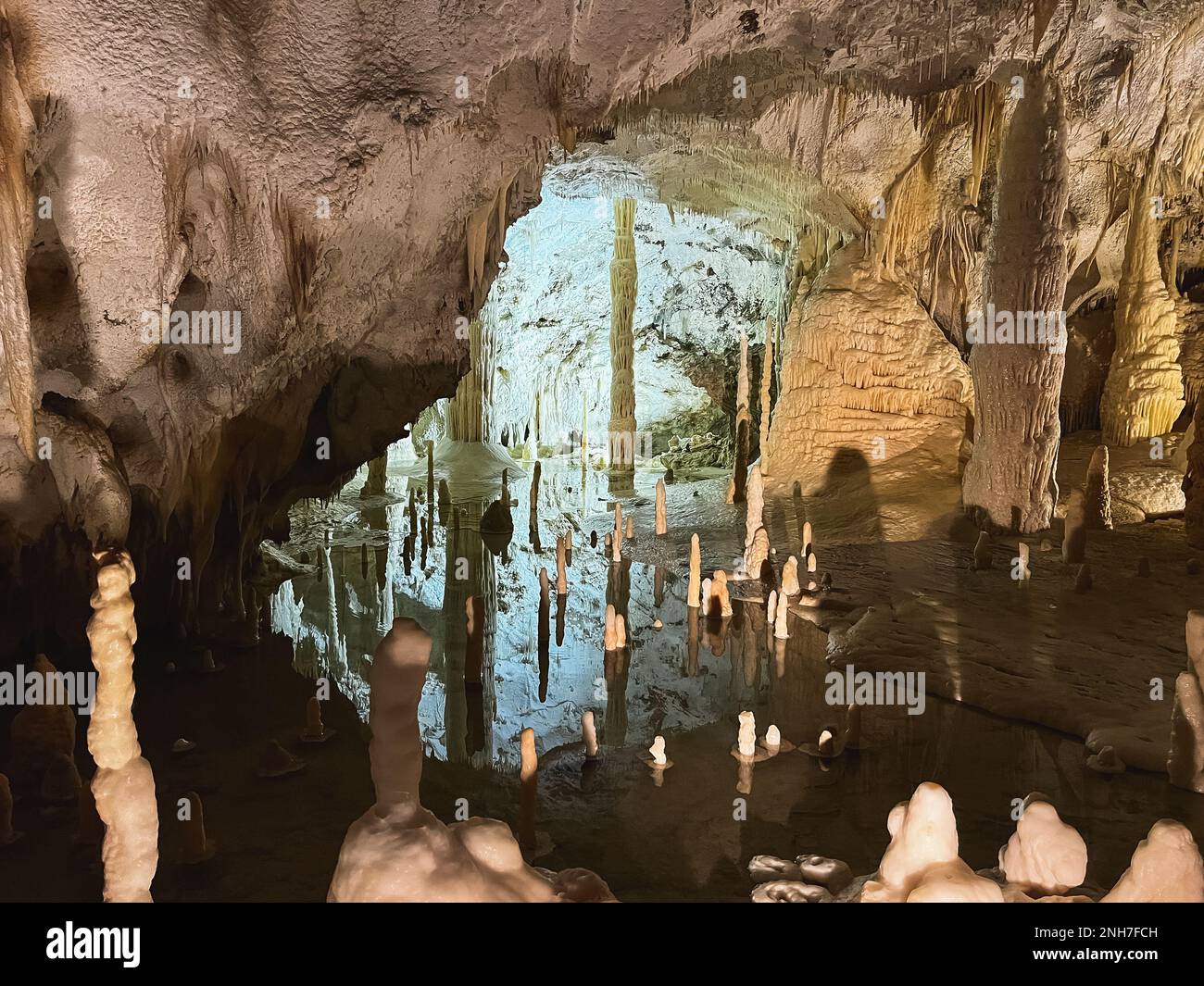 Inner Lake in Karst Cave with Stalactites and Stalagmites. Limestone Formations, Natural Beauty Landscape Stock Photo